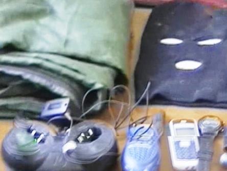 من الأسلحة والأجهزة المضبوطة مع  الإرهابي صالح الشاوش